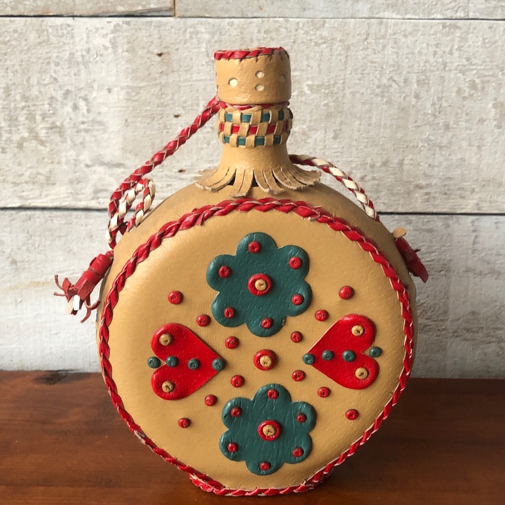 Folk art leather-wrapped canteen/decanter